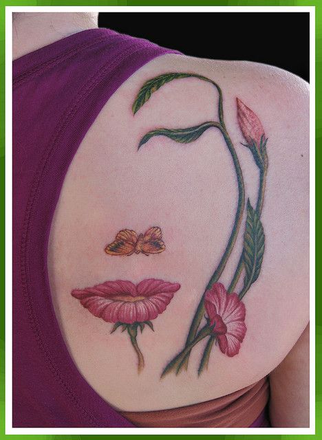 Featured image of post Flower In Mouth Tattoo